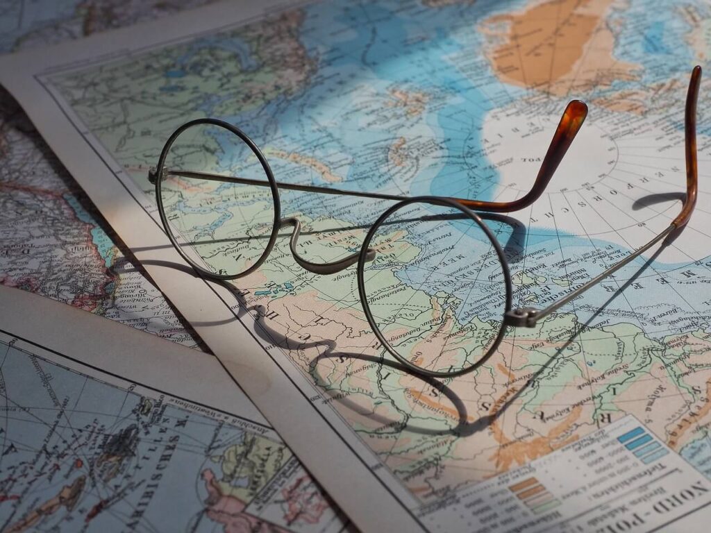 Glasses on a world map