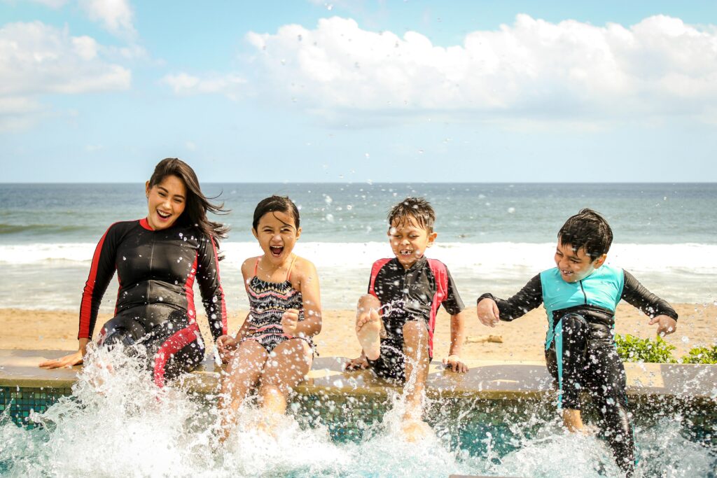 A family playing in the water on vacation