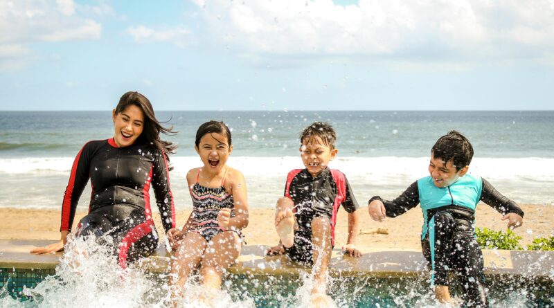 A family playing in the water on vacation