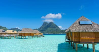 Overwater Bungalows over crystal clear waters in Bora Bora