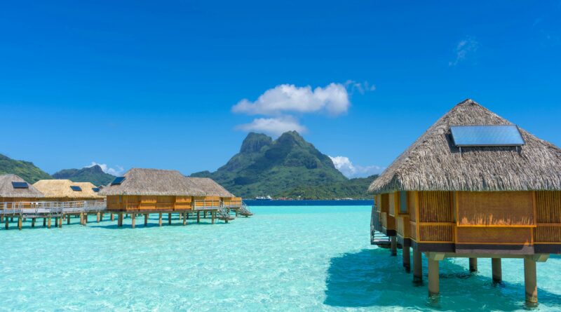 Overwater Bungalows over crystal clear waters in Bora Bora