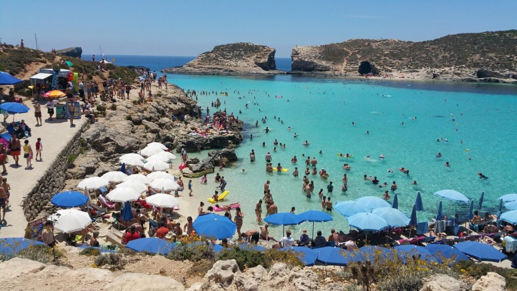 Plenty of people in the Blue Lagoon in Comino Island