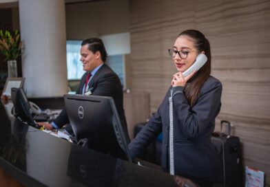 Female hotel receptionist on the phone