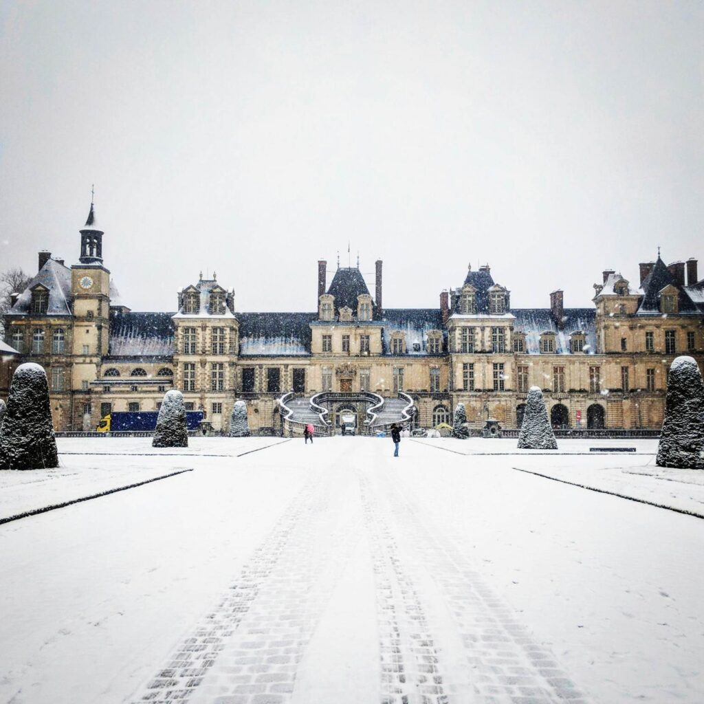 The Fontainebleau Castle covered in snow.  