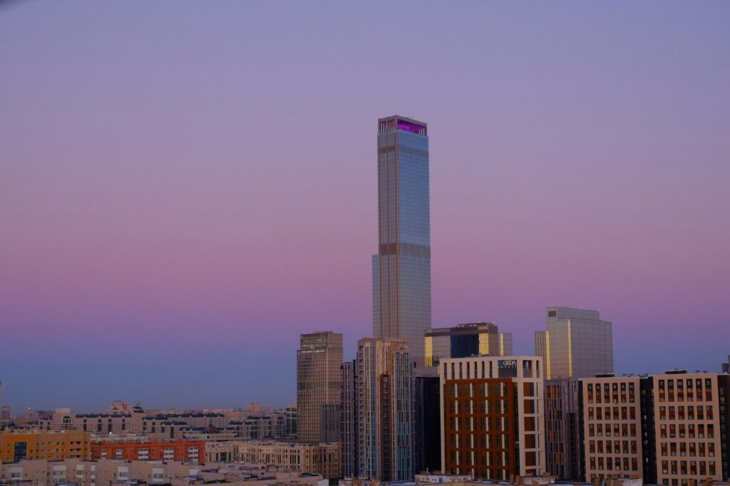 Purple sky above city scapers in Astana