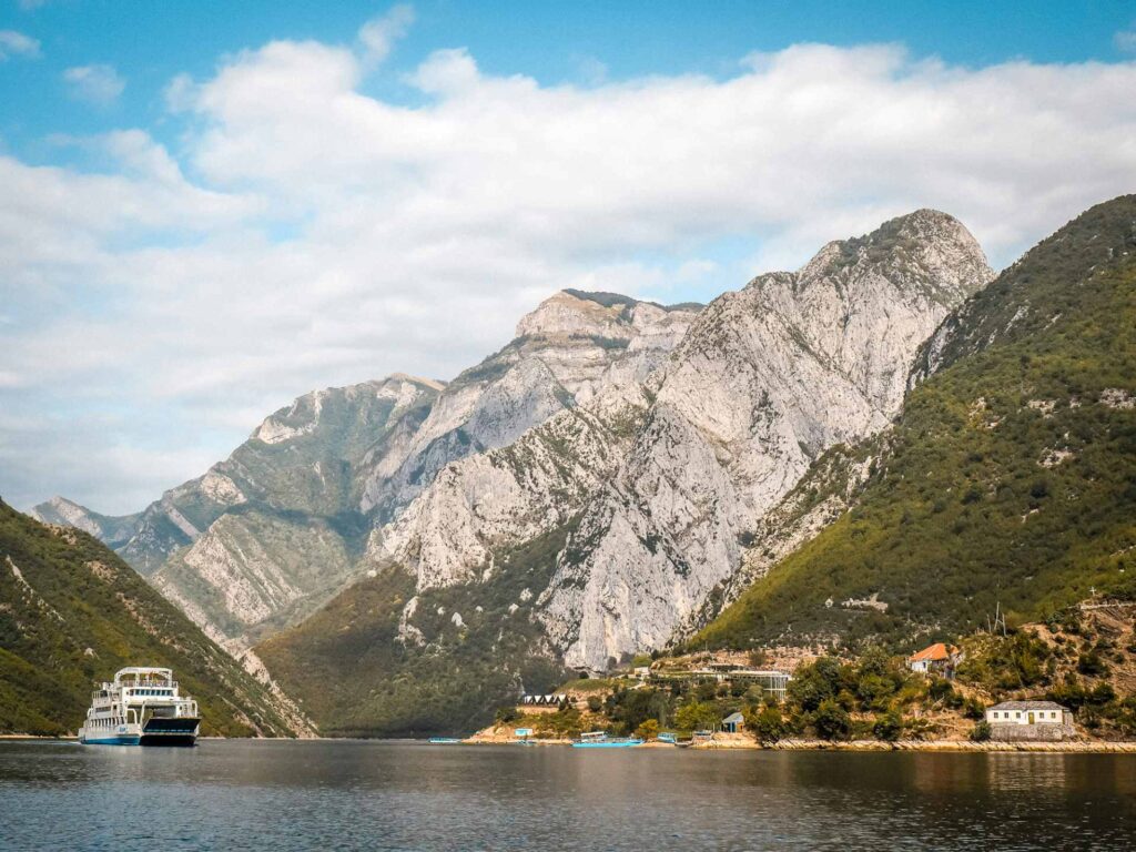 A ship sailing through Lake Komani