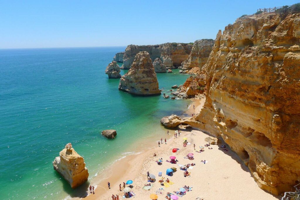Cliffside coastal walkway in Portugal's Algarve region