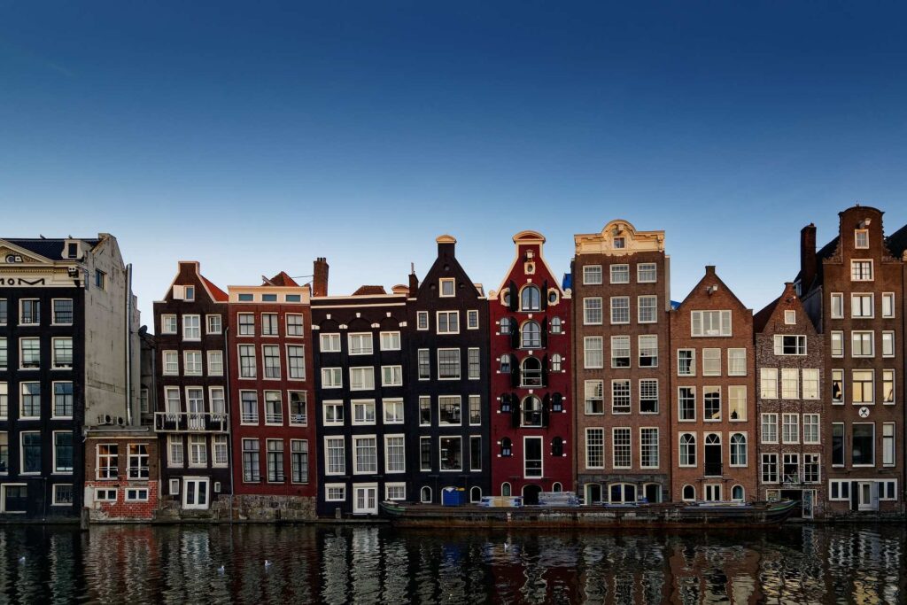 Amsterdam canal houses, a popular first stop for a family trip to Europe
