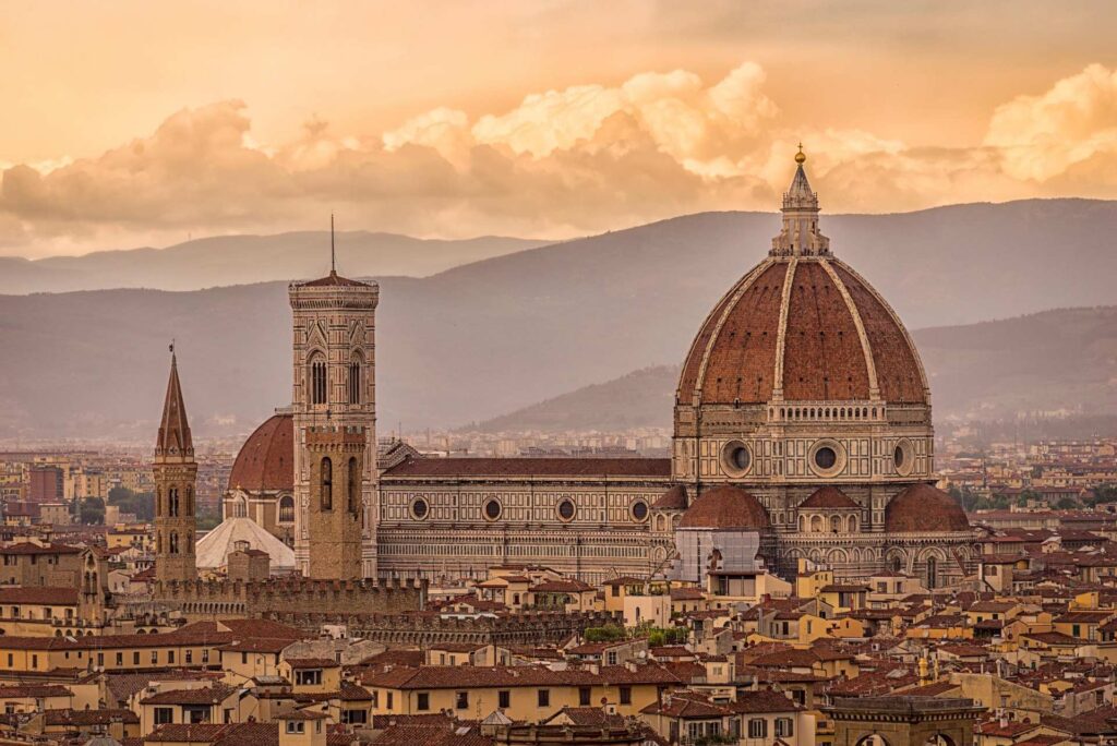 Florence skyline with the red dome of the Duomo, seen from Piazzale Michelangelo at sunset