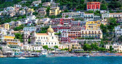Colorful houses above the sea in Positano, one of the best places to visit in Italy for the first time