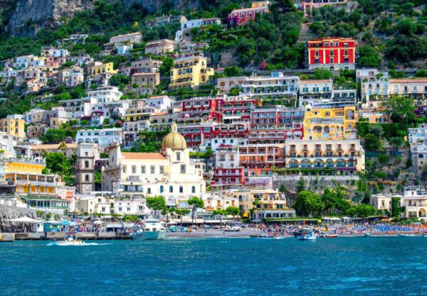 Colorful houses above the sea in Positano, one of the best places to visit in Italy for the first time