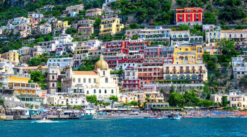Colorful houses above the sea in Positano, one of the best places to visit in Italy for the first time