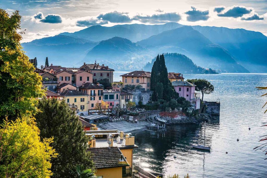 Colorful lakeside village of Varenna on Lake Como with a mountain behind